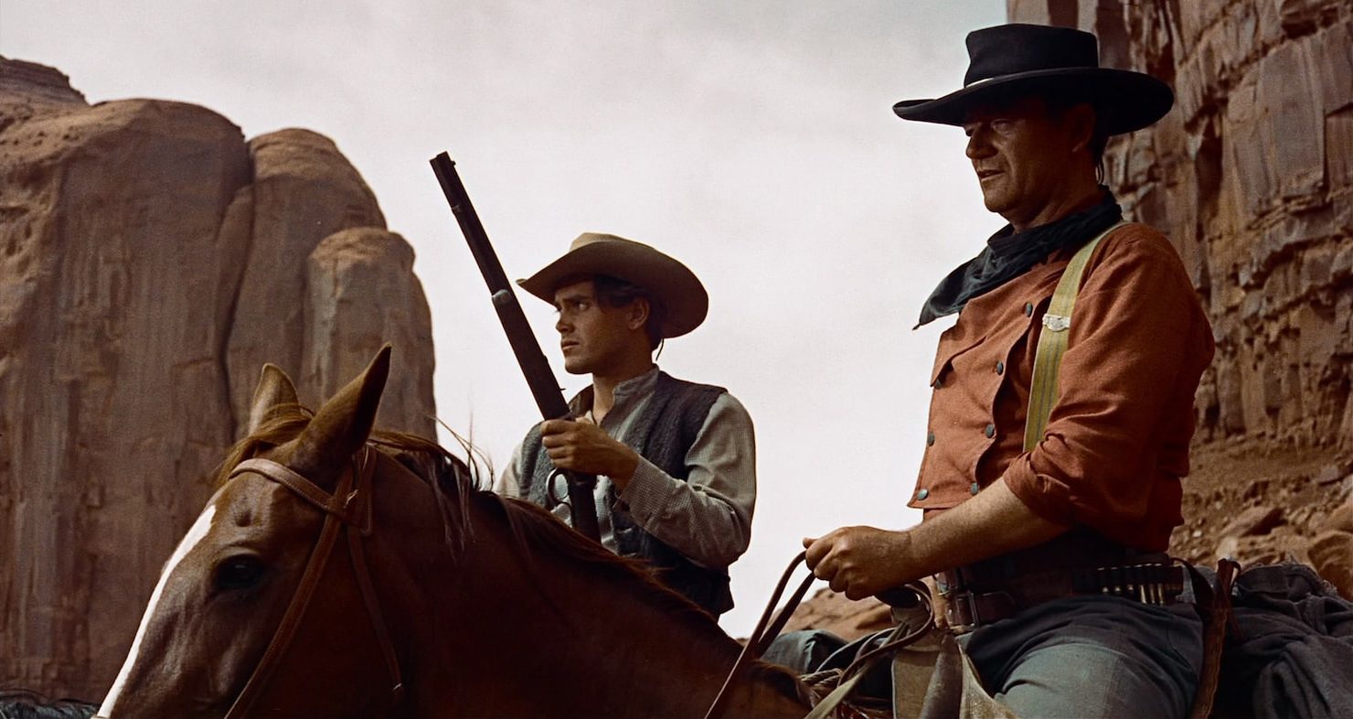 Fra filmen The Searchers, to cowboys til hest, John Wayne